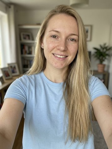 Input portrait: Blue tee, long blonde hair